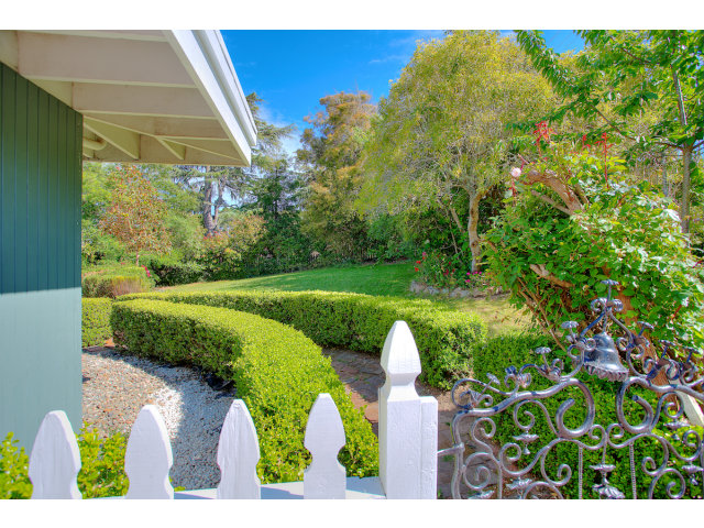 3 Spring Valley Lane Millbrae, CA 94030 - Photo 16 of 16 a view of a table and chairs in the garden