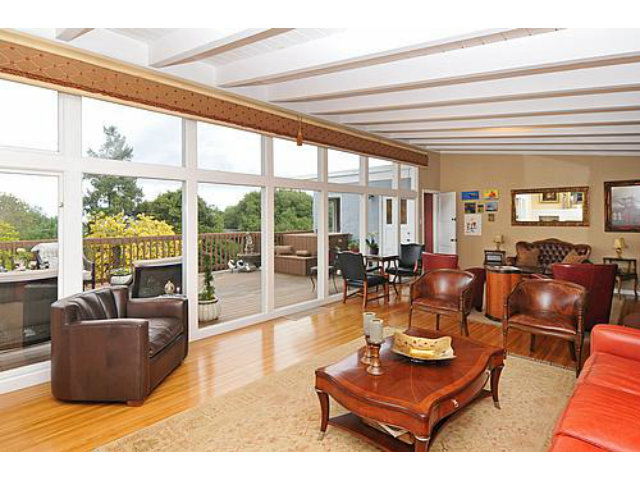 3 Spring Valley Lane Millbrae, CA 94030 - Photo 3 of 16 a living room with furniture and a large window