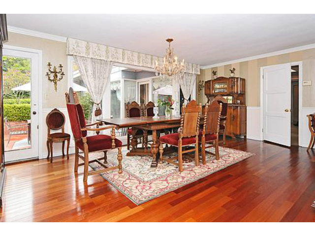 3 Spring Valley Lane Millbrae, CA 94030 - Photo 5 of 16 a dining room with furniture a chandelier and wooden floor