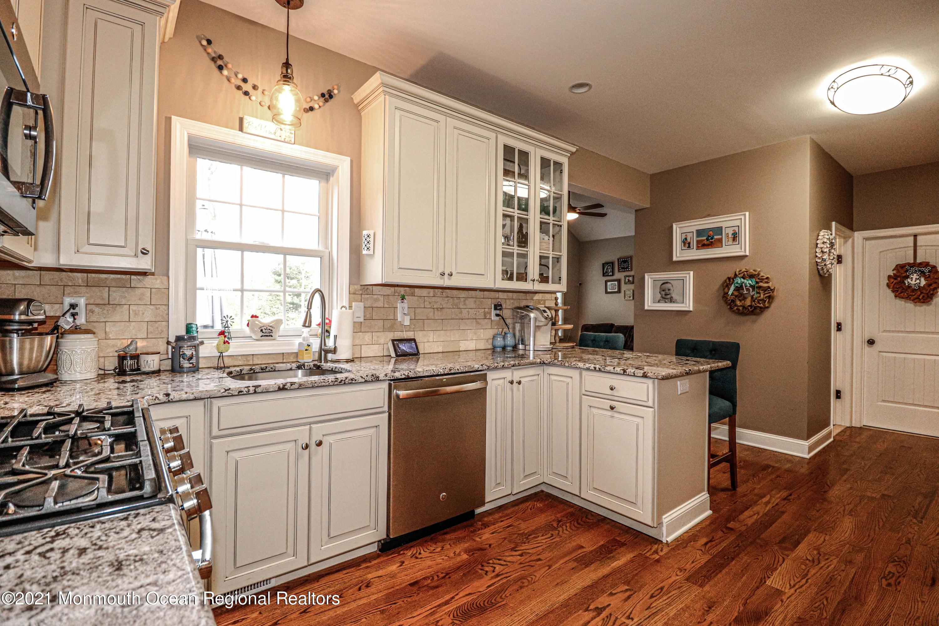 10 Letts Landing Road Waretown, NJ 08758 - Photo 12 of 51 a kitchen with stainless steel appliances granite countertop a stove sink and cabinets