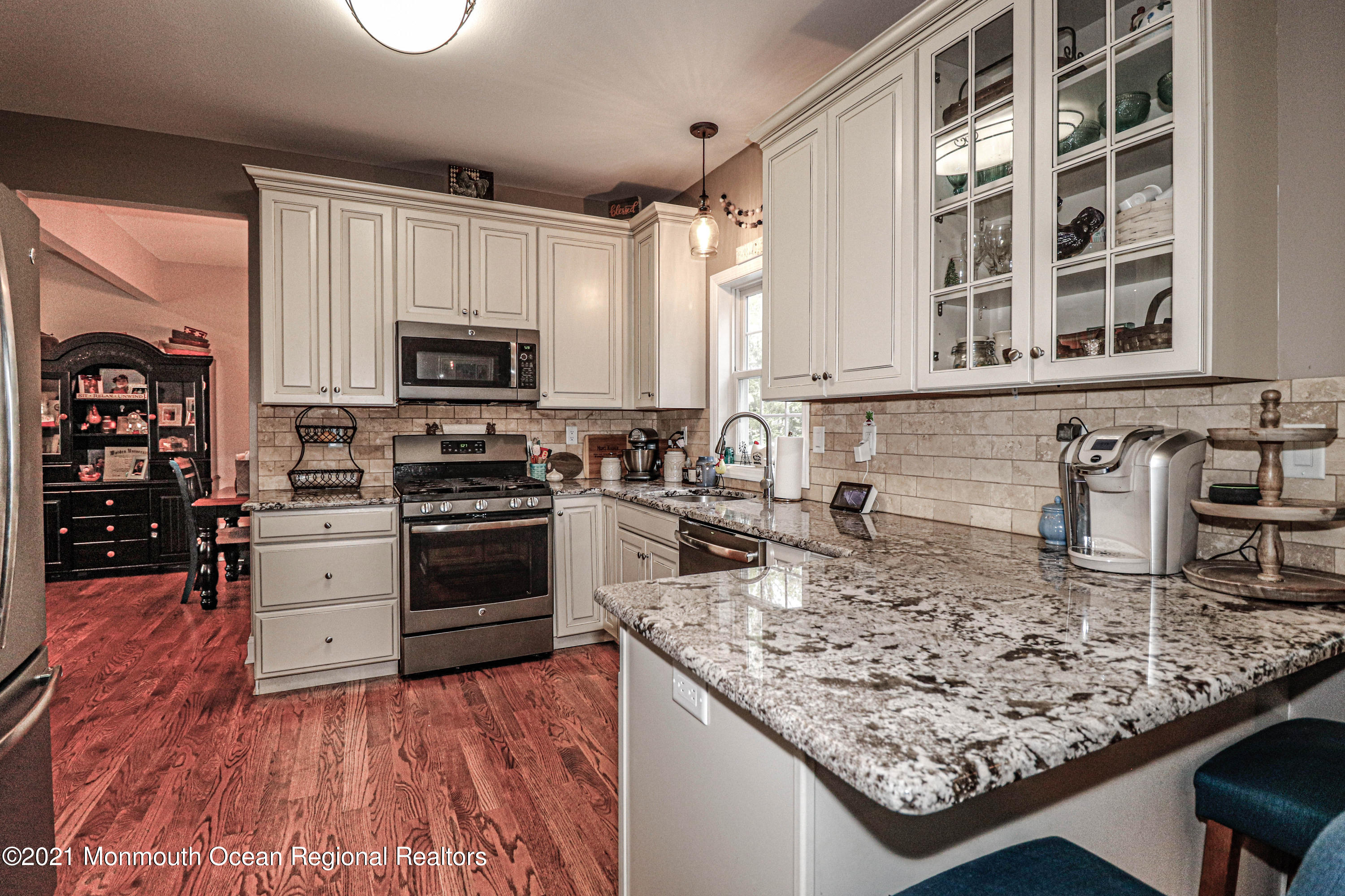 10 Letts Landing Road Waretown, NJ 08758 - Photo 13 of 51 a kitchen with stainless steel appliances granite countertop a stove and a sink