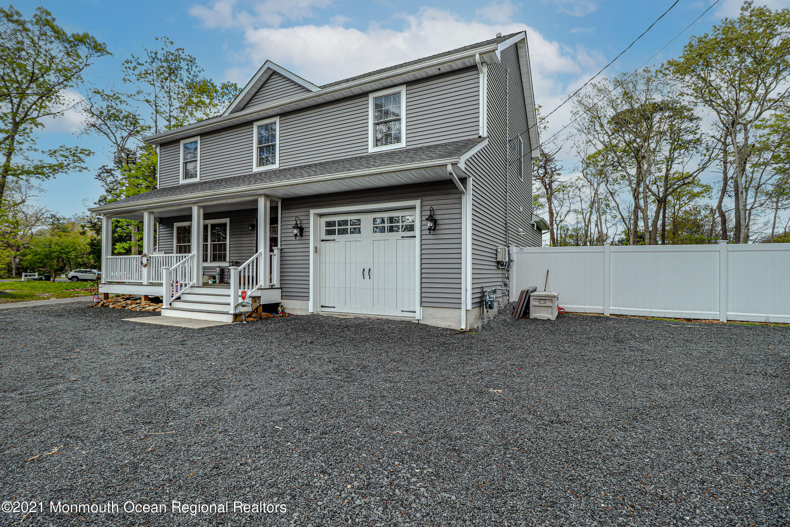 10 Letts Landing Road Waretown, NJ 08758 - Photo 3 of 51 a white house that has a tree in front of it