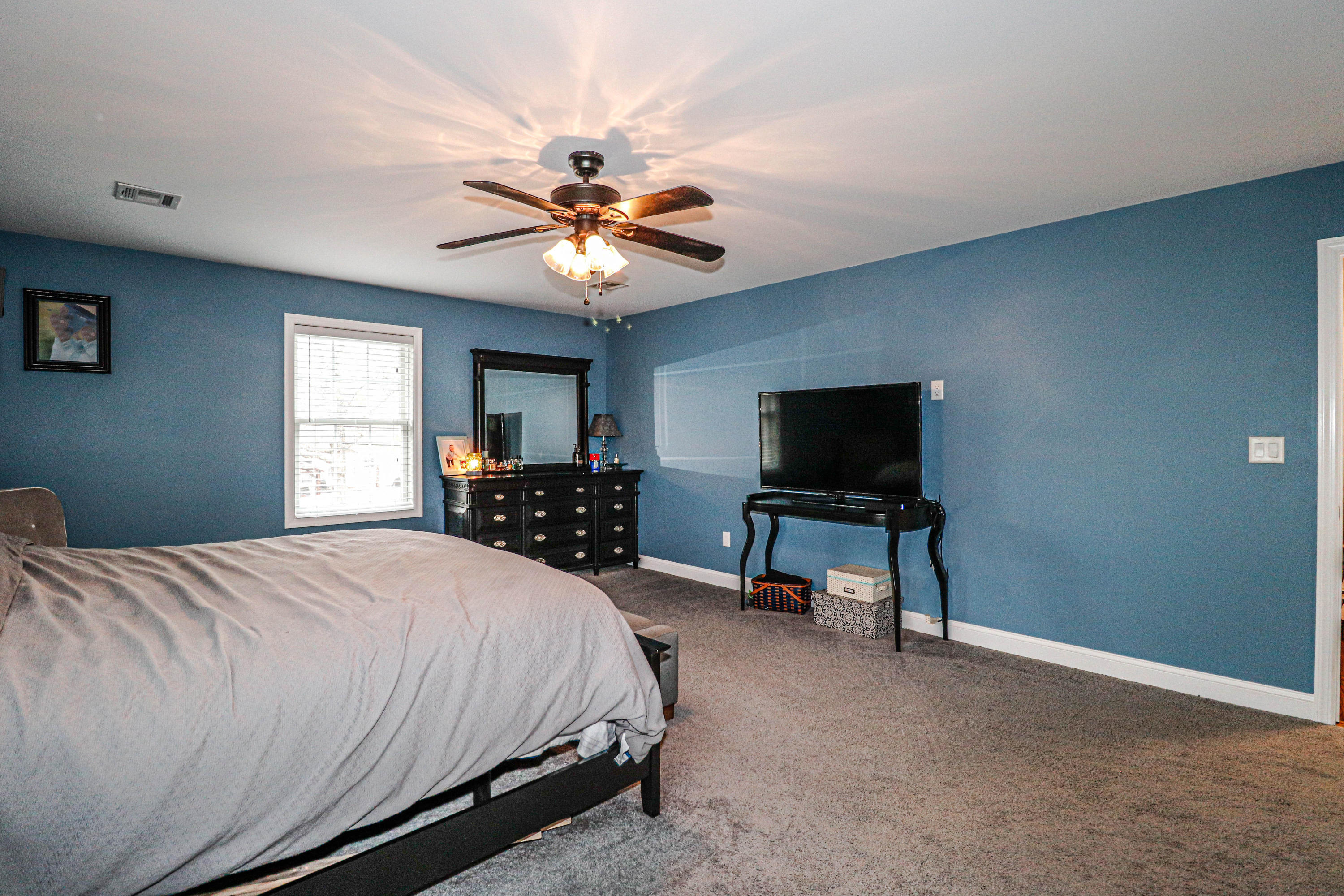10 Letts Landing Road Waretown, NJ 08758 - Photo 27 of 51 a bedroom with a bed and a flat screen tv