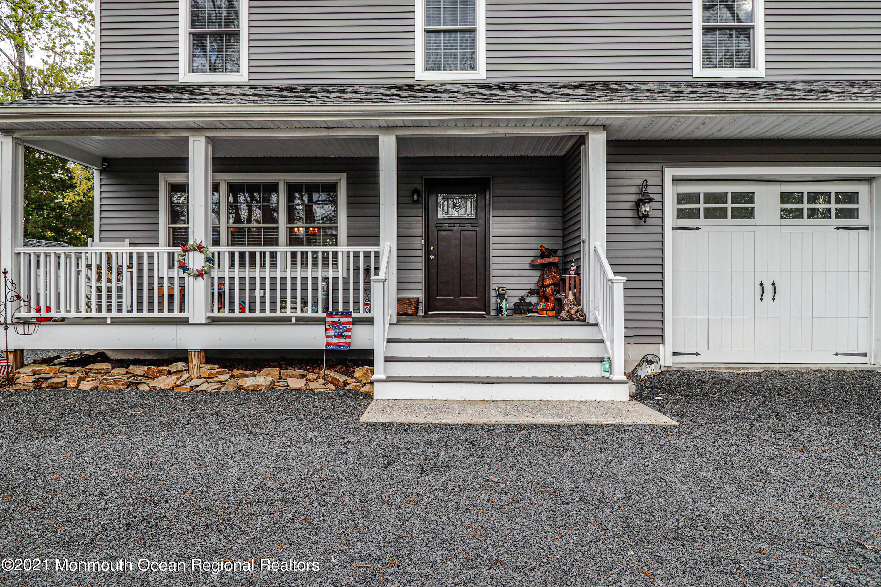 10 Letts Landing Road Waretown, NJ 08758 - Photo 4 of 51 a front view of a house with a yard