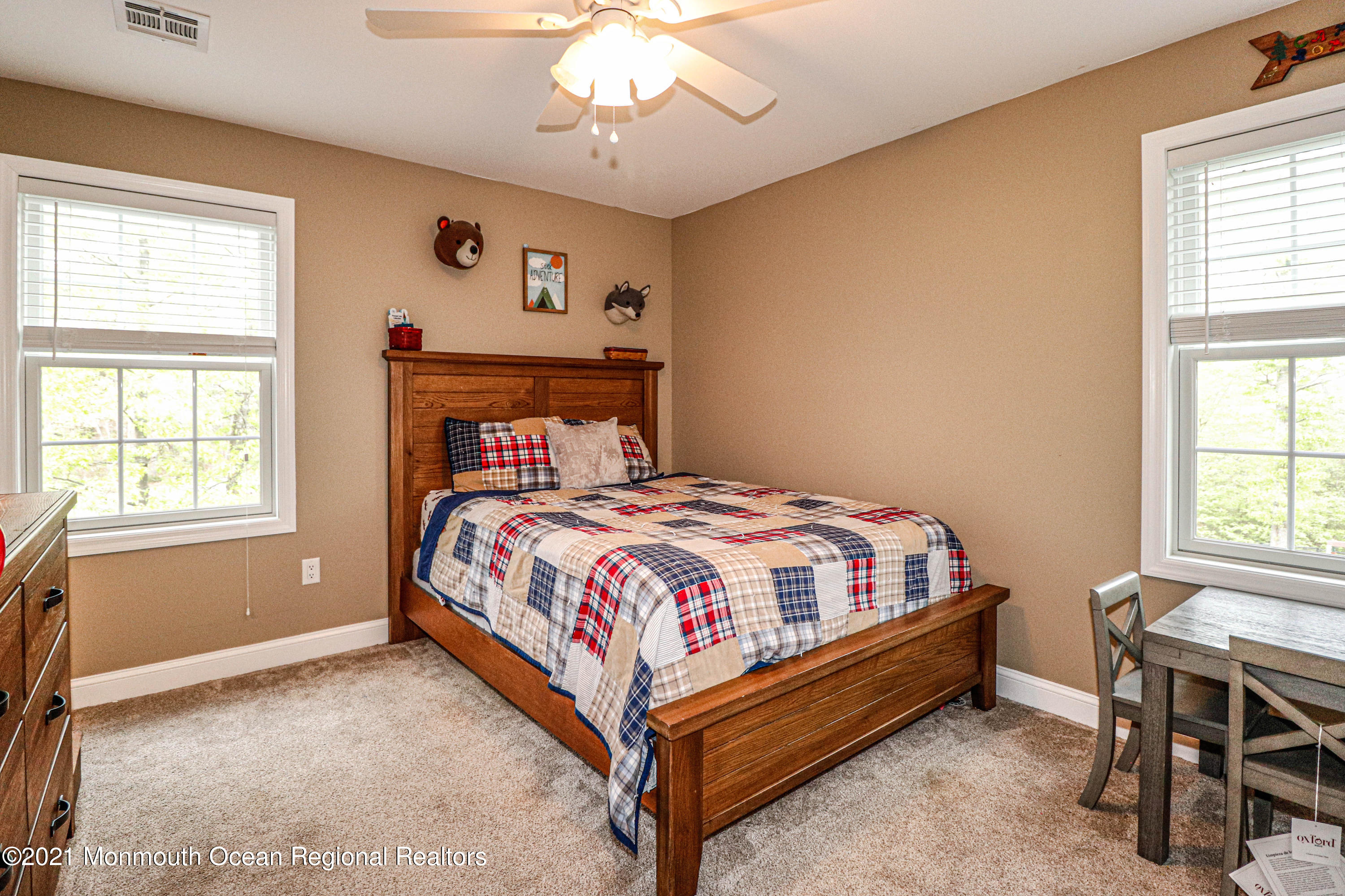 10 Letts Landing Road Waretown, NJ 08758 - Photo 31 of 51 a bed sitting in a bedroom next to a window