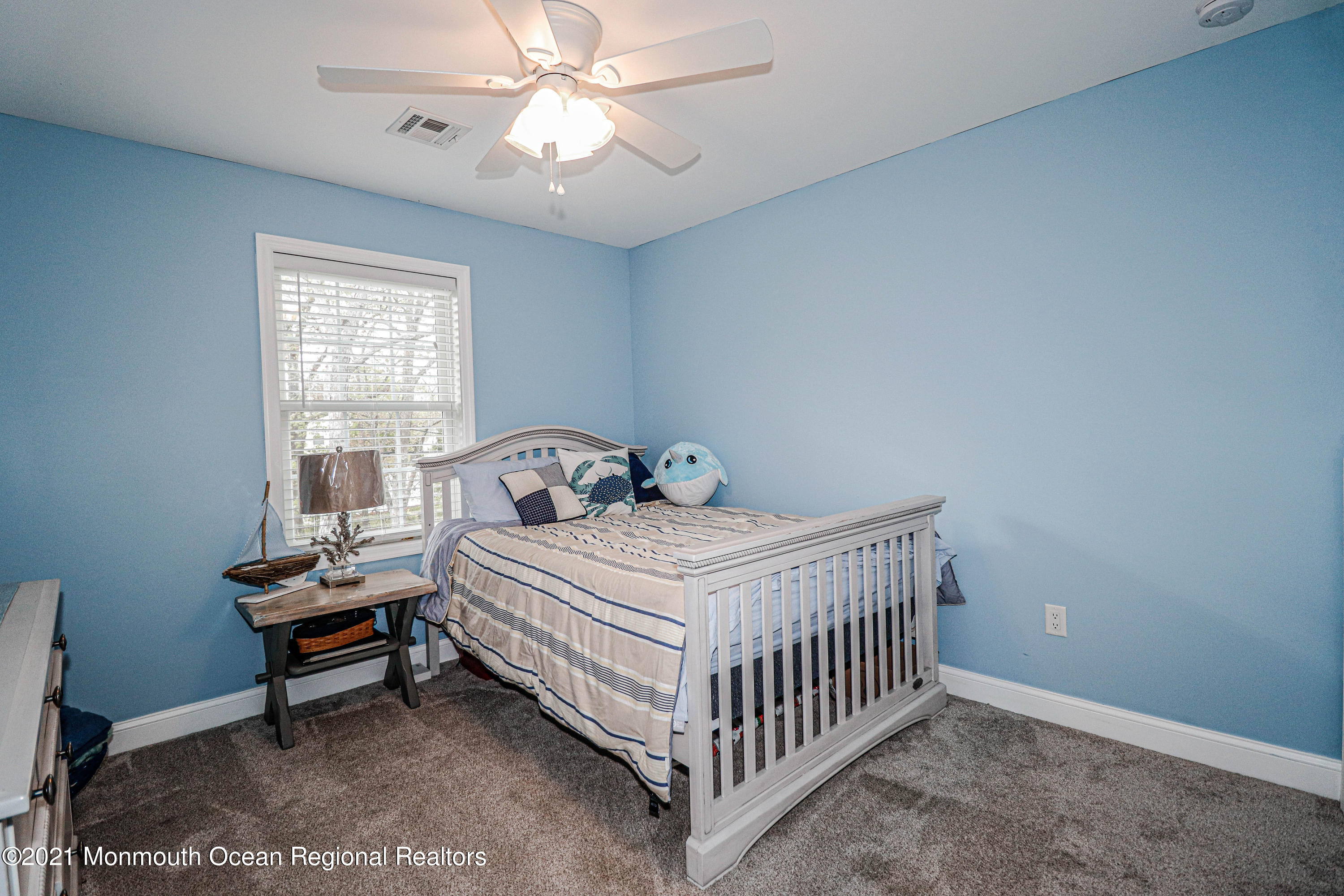 10 Letts Landing Road Waretown, NJ 08758 - Photo 32 of 51 a bedroom with a bed and a window