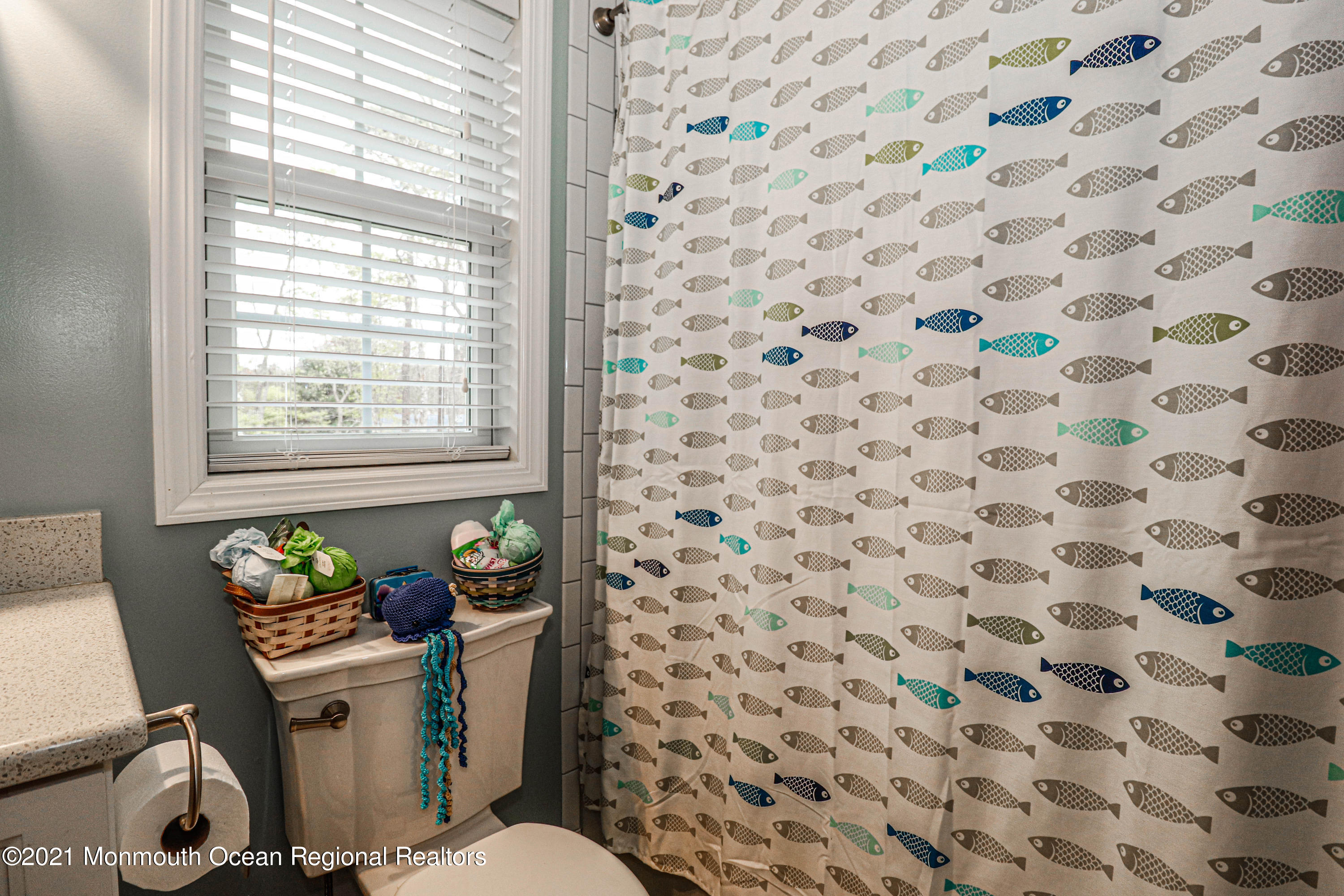 10 Letts Landing Road Waretown, NJ 08758 - Photo 34 of 51 a bathroom with a toilet and a shower curtain