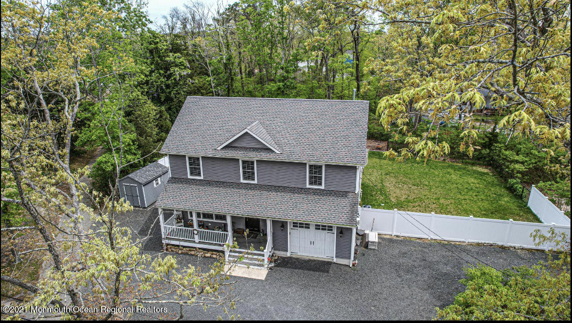 10 Letts Landing Road Waretown, NJ 08758 - Photo 46 of 51 an aerial view of a house with a yard