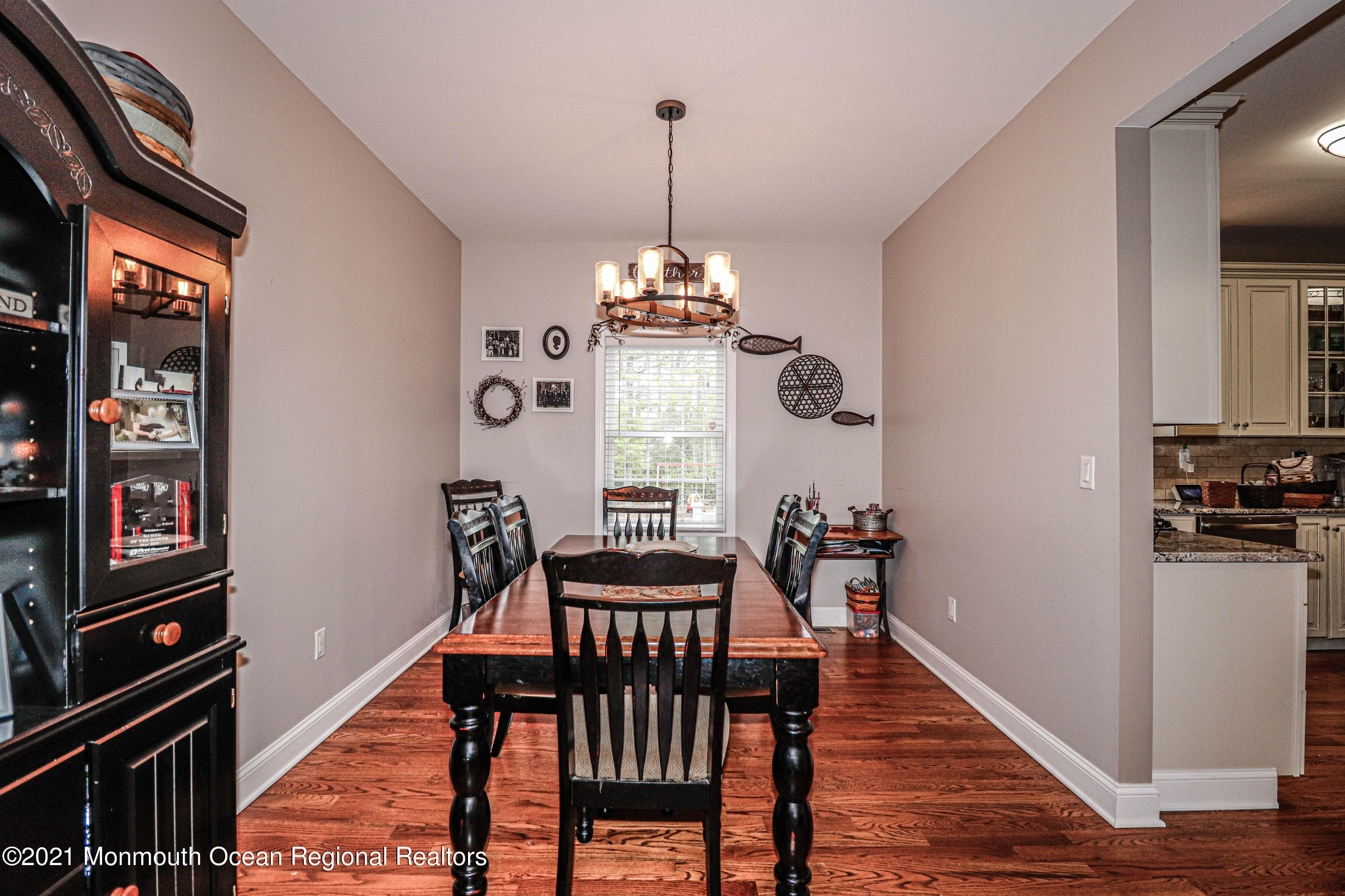 10 Letts Landing Road Waretown, NJ 08758 - Photo 9 of 51 a view of a dining room with furniture window and wooden floor