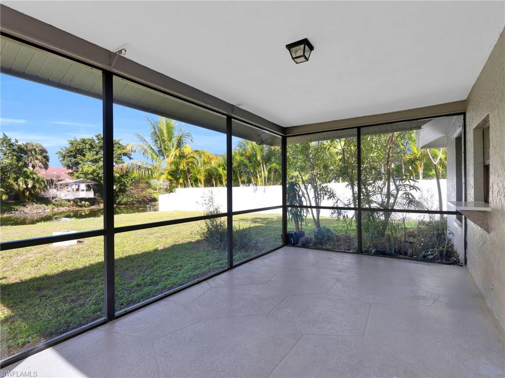 4991 18th Court Southwest Naples, FL 34116 - Photo 23 of 36 a view of porch with a floor to ceiling window