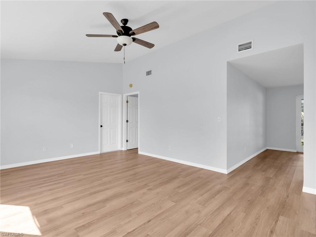 4991 18th Court Southwest Naples, FL 34116 - Photo 7 of 36 a view of an empty room with a window