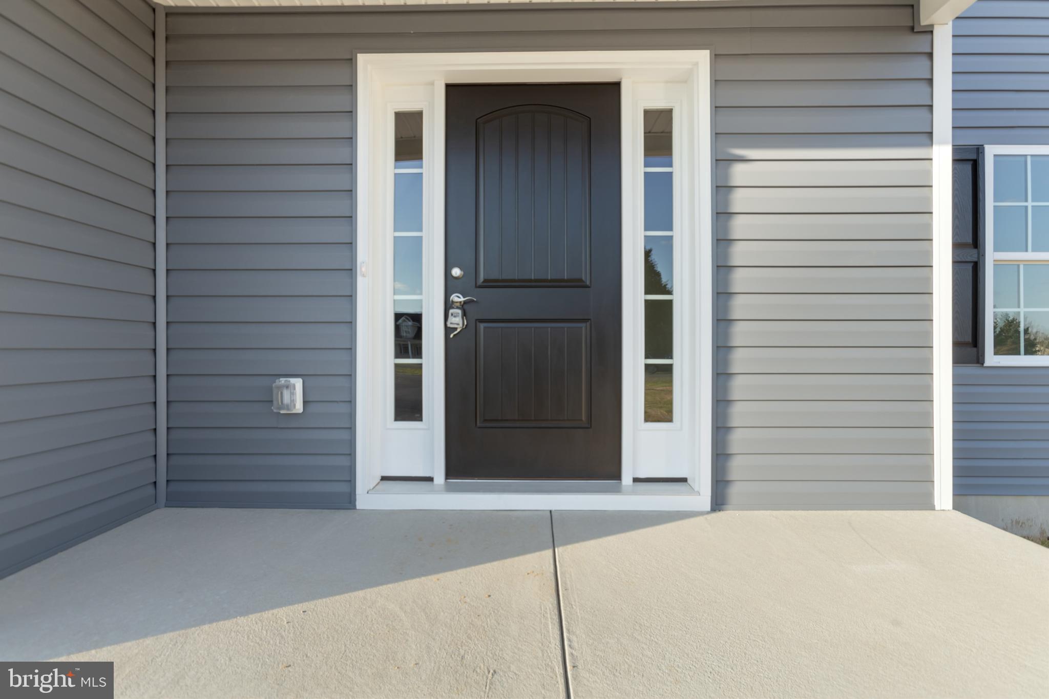 21625 Hackney Circle Lincoln, DE 19960 - Photo 11 of 46 a view of entrance door of the house