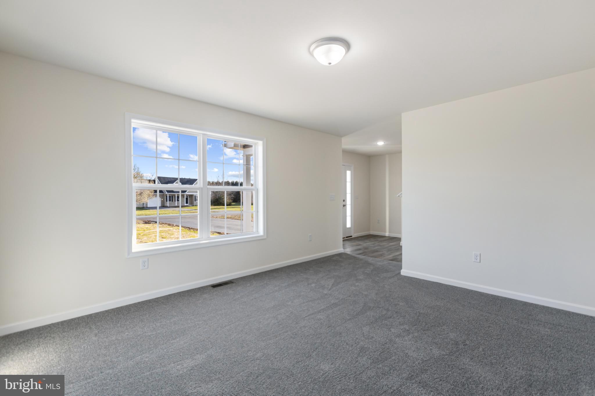21625 Hackney Circle Lincoln, DE 19960 - Photo 16 of 46 a view of an empty room with a window