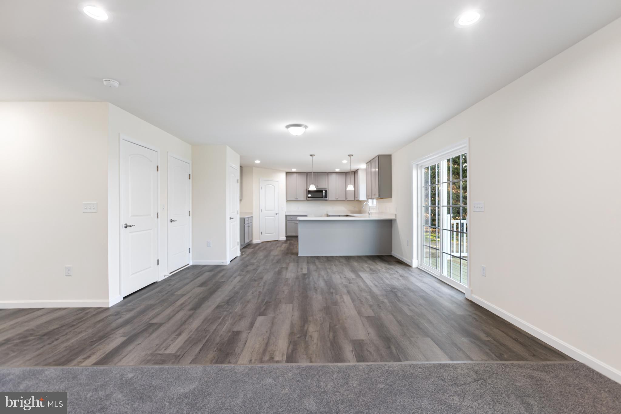 21625 Hackney Circle Lincoln, DE 19960 - Photo 20 of 46 a view of kitchen with wooden floor
