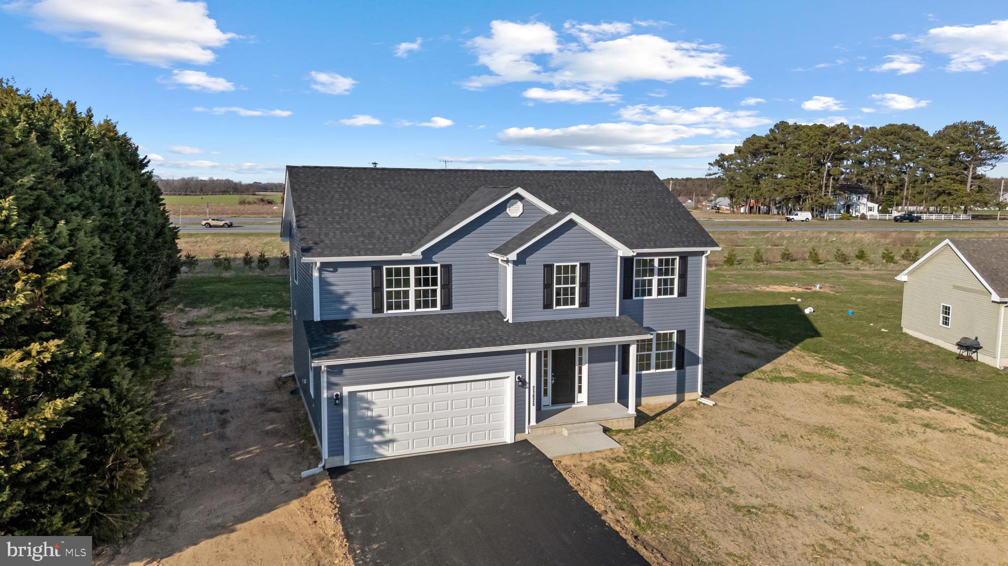 21625 Hackney Circle Lincoln, DE 19960 - Photo 2 of 46 a view of house with outdoor space