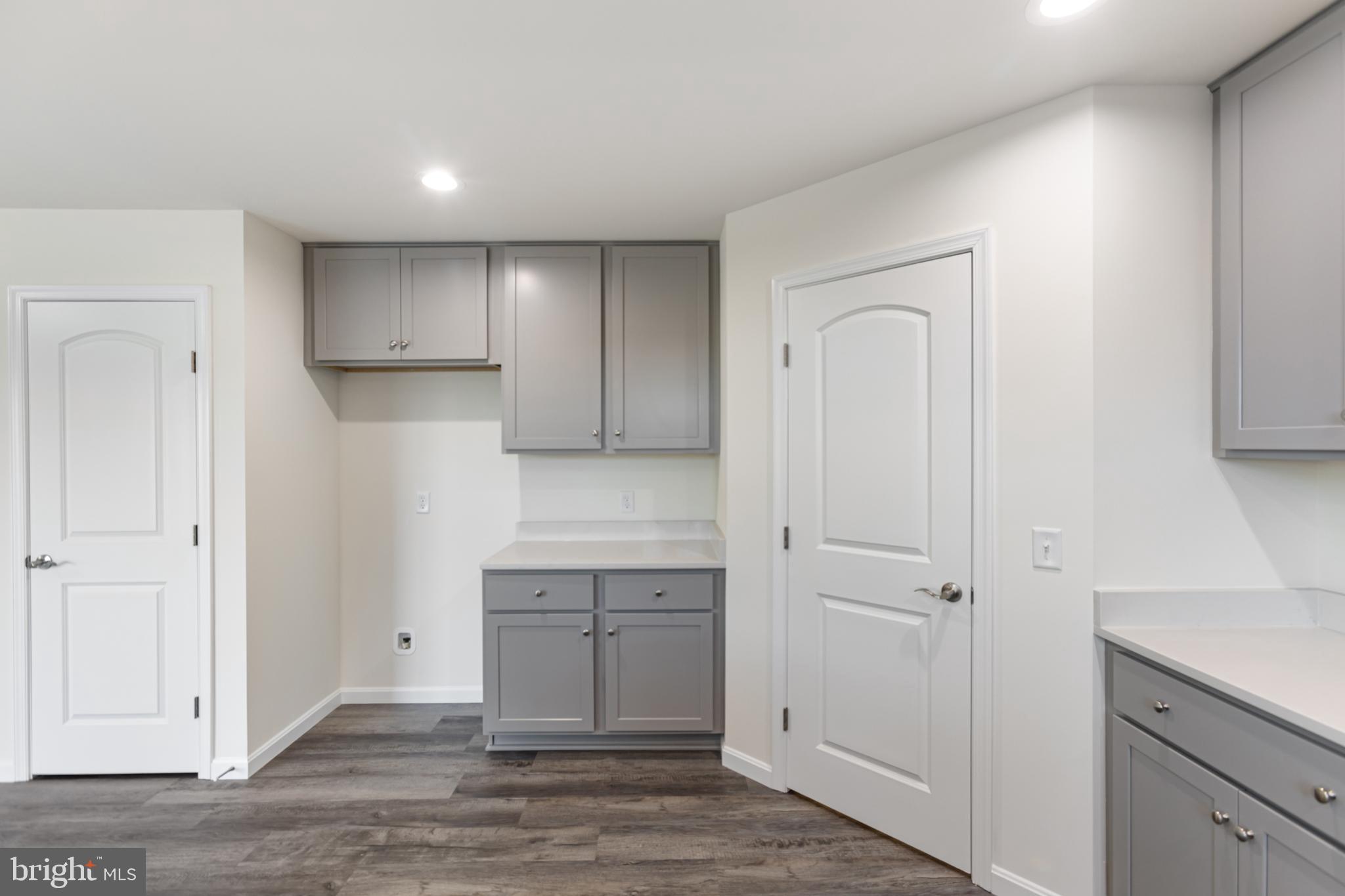 21625 Hackney Circle Lincoln, DE 19960 - Photo 26 of 46 a view of cabinets and wooden floor