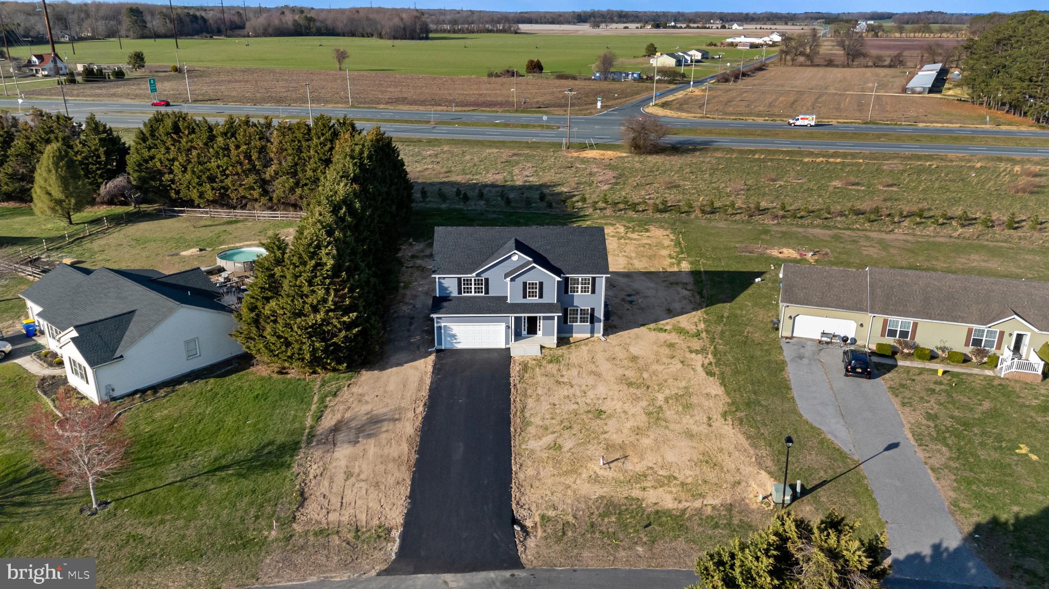 21625 Hackney Circle Lincoln, DE 19960 - Photo 3 of 46 an aerial view of a house with a lake view
