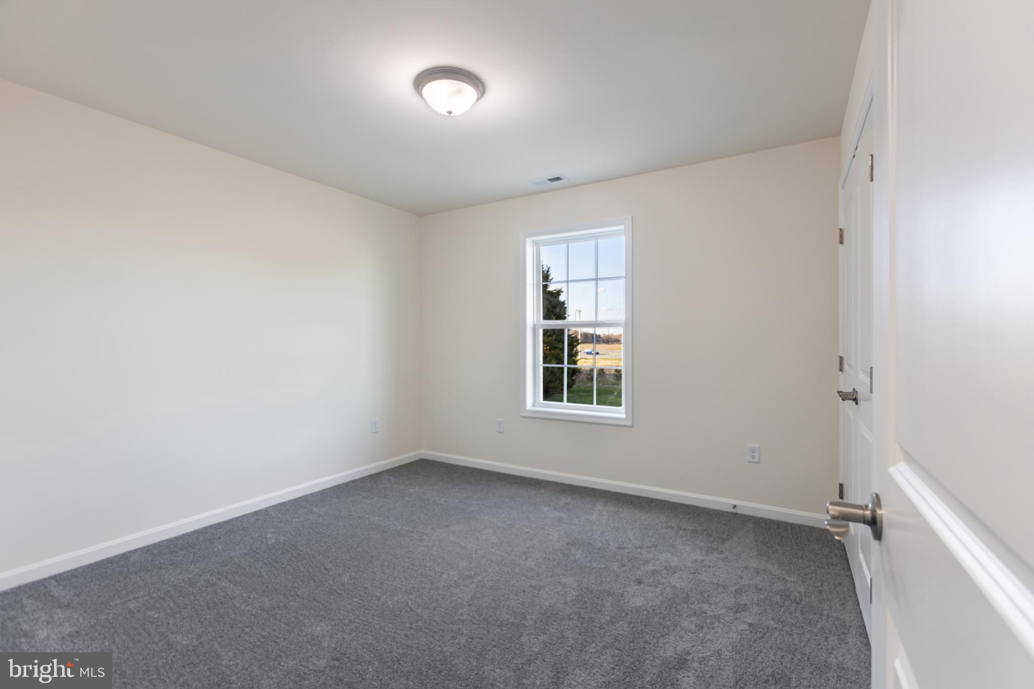 21625 Hackney Circle Lincoln, DE 19960 - Photo 35 of 46 an empty room with a window