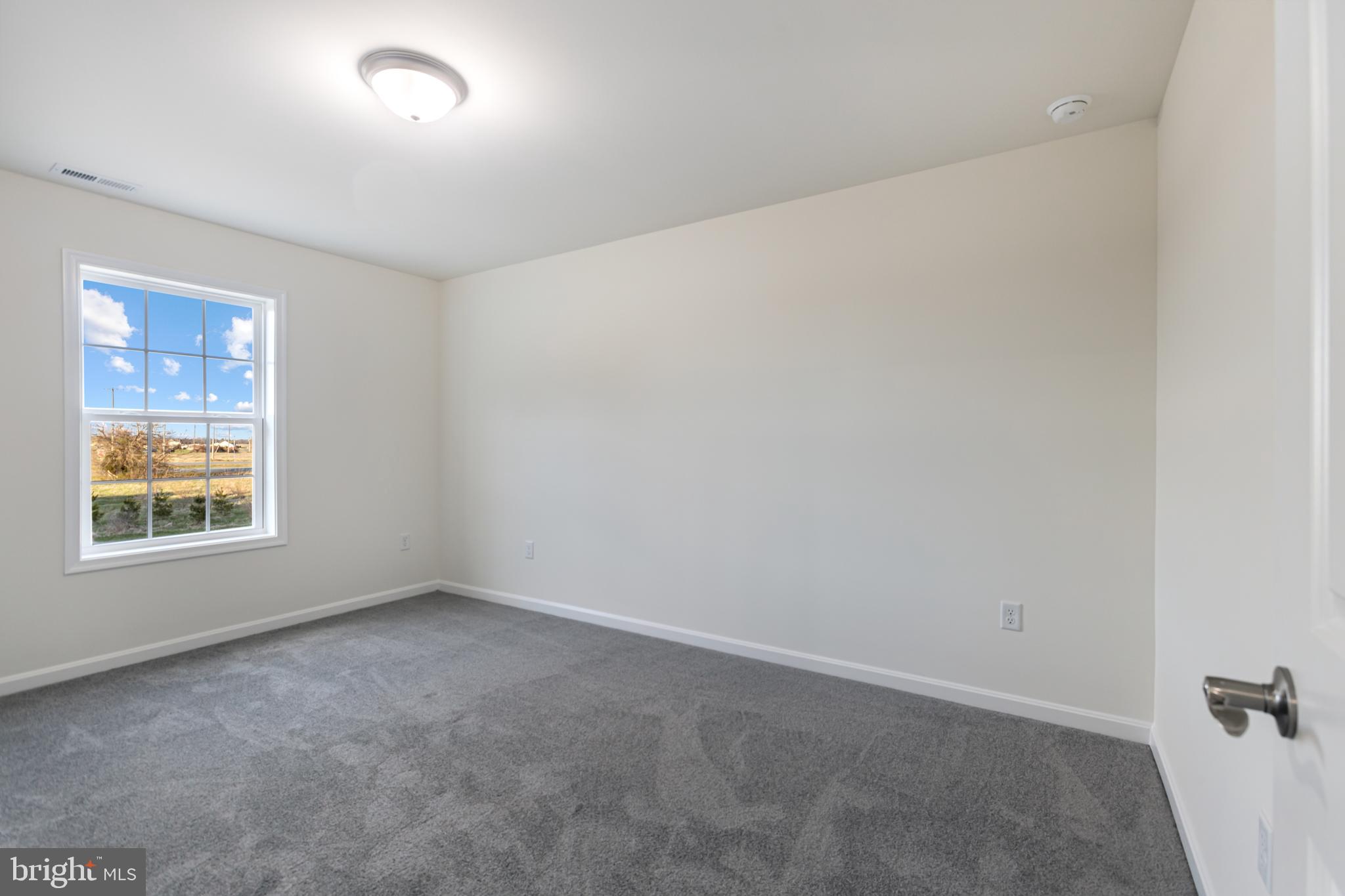 21625 Hackney Circle Lincoln, DE 19960 - Photo 37 of 46 an empty room with a window