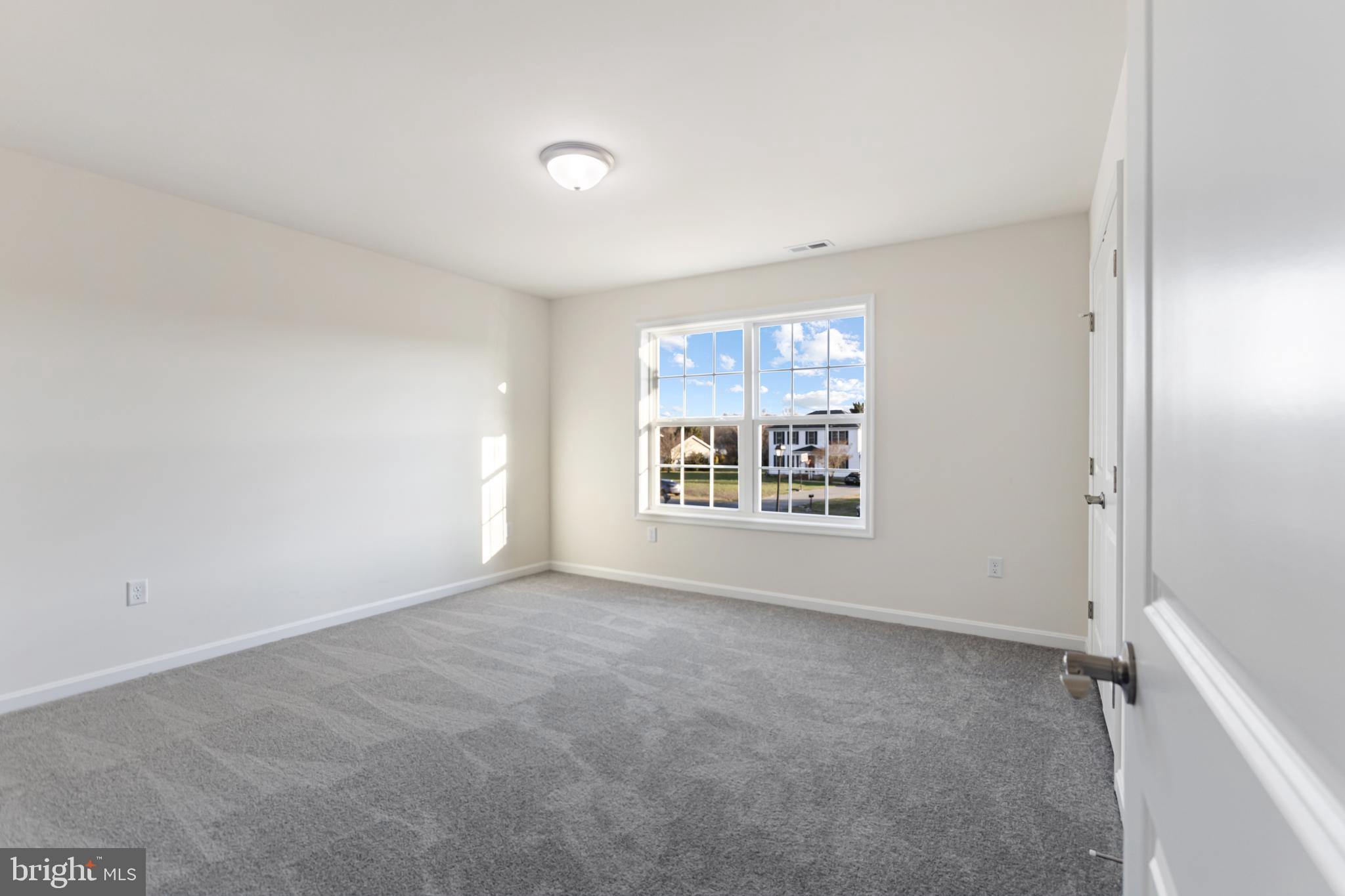 21625 Hackney Circle Lincoln, DE 19960 - Photo 39 of 46 an empty room with windows
