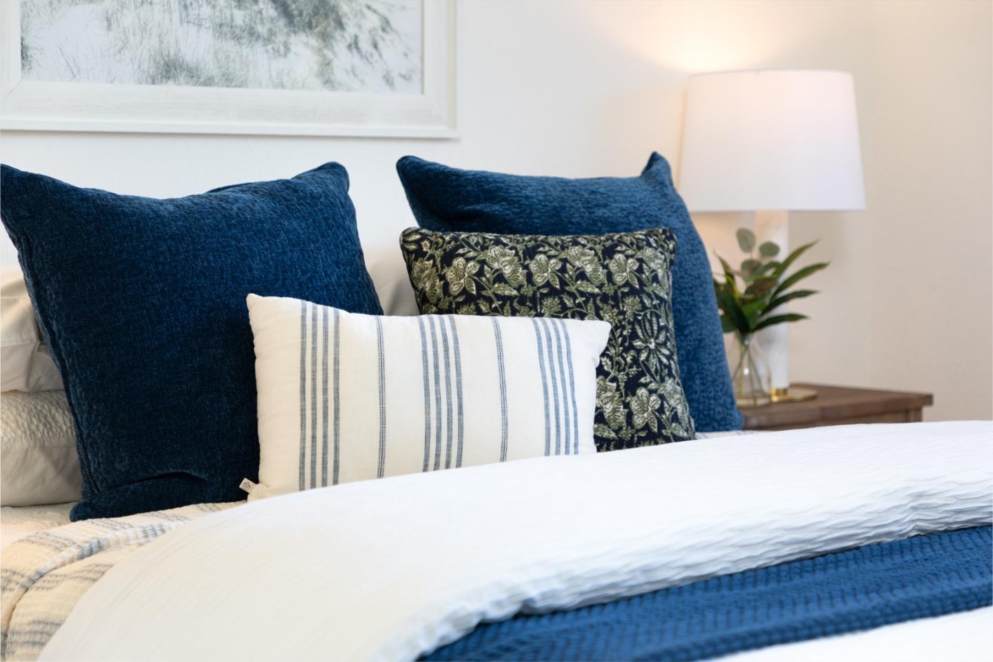 4475 Diamond Street, Unit 3 Capitola, CA 95010 - Photo 15 of 36 a bed sitting in a bedroom and chair with potted plant