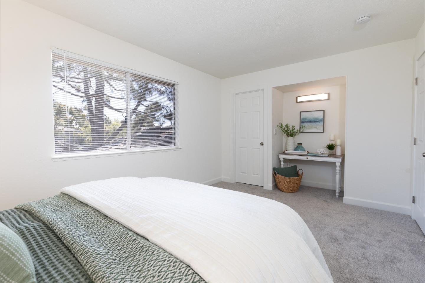 4475 Diamond Street, Unit 3 Capitola, CA 95010 - Photo 19 of 36 a bedroom with a bed and a window