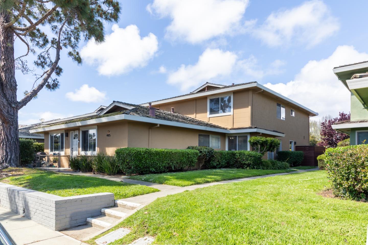 4475 Diamond Street, Unit 3 Capitola, CA 95010 - Photo 2 of 36 a front view of a house with garden