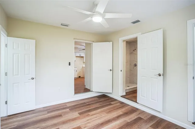 a view of a livingroom with wooden floor
