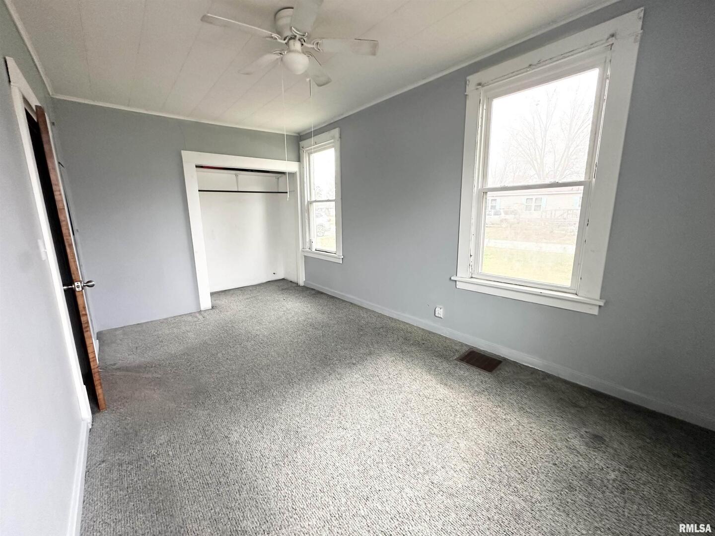 103 East 11th Street Belle Rive, IL 62810 - Photo 19 of 25 a view of an empty room with a window