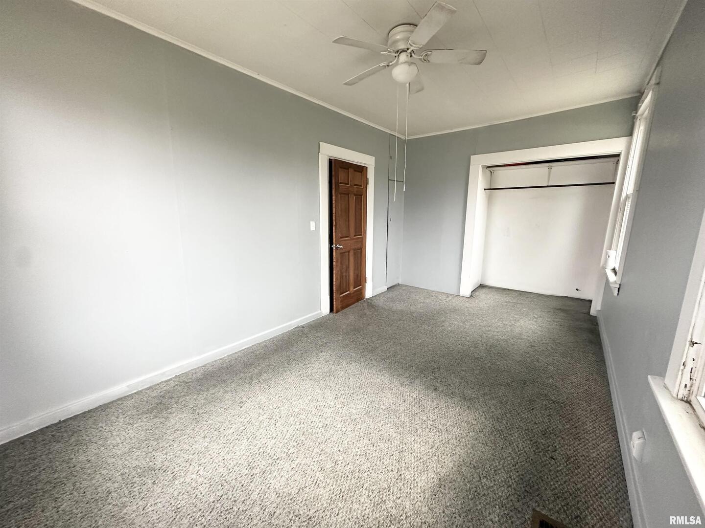 103 East 11th Street Belle Rive, IL 62810 - Photo 20 of 25 a view of an empty room with a window
