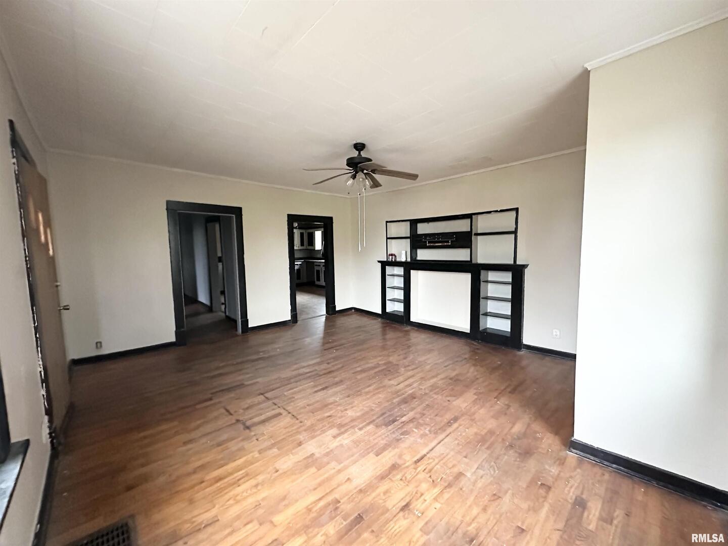 103 East 11th Street Belle Rive, IL 62810 - Photo 23 of 25 wooden floor in an empty room with a window