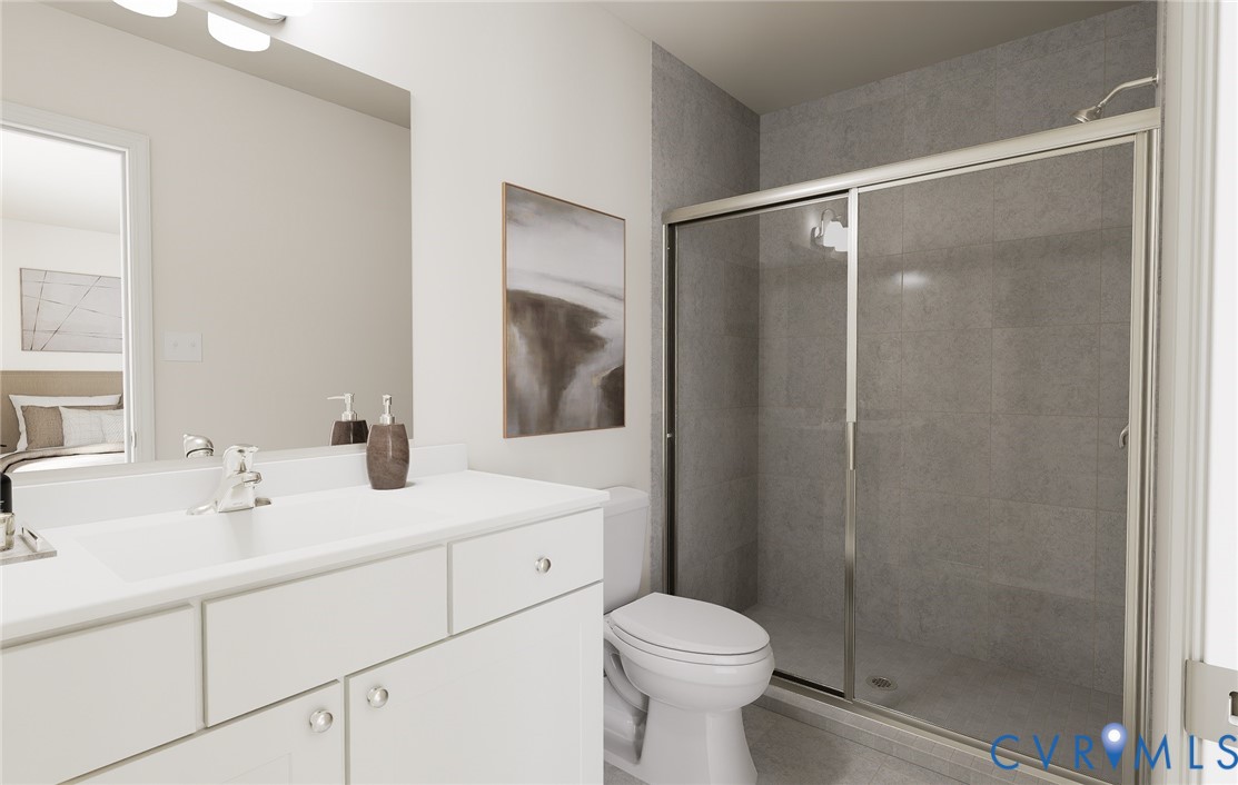 286 Greenpark Road Sandston, VA 23150 - Photo 15 of 26 a bathroom with a sink toilet and shower