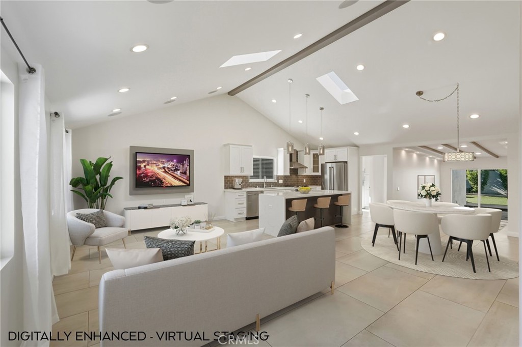 6017 Encino Encino, CA 91316 - Photo 12 of 51 a living room with furniture and a flat screen tv