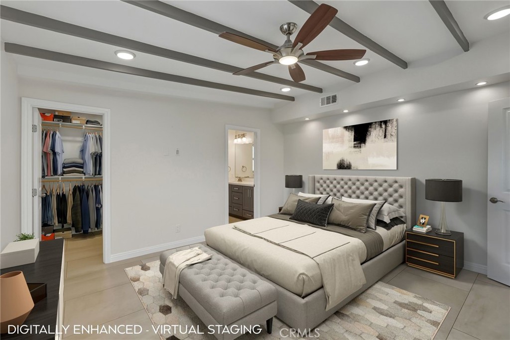 6017 Encino Encino, CA 91316 - Photo 19 of 51 a bedroom with a large bed and a couch