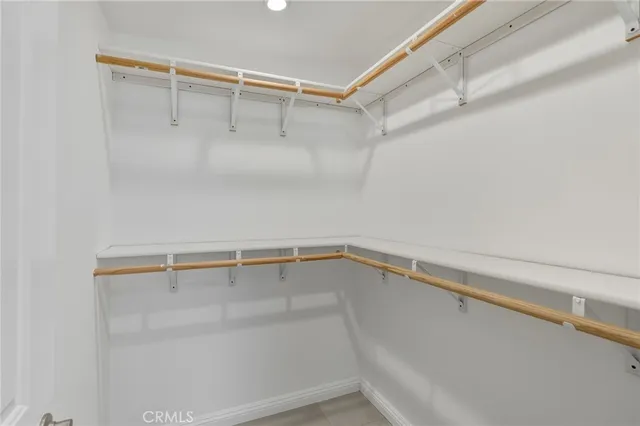 a view of an empty walk in closet