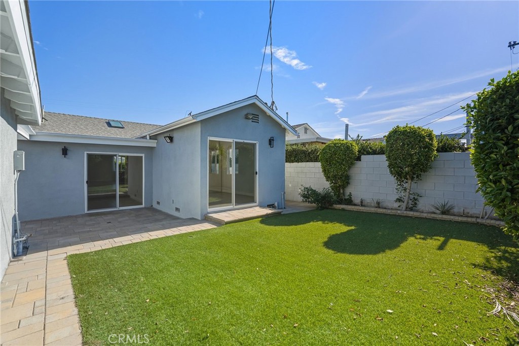 6017 Encino Encino, CA 91316 - Photo 37 of 51 a view of a house with a swimming pool and a yard