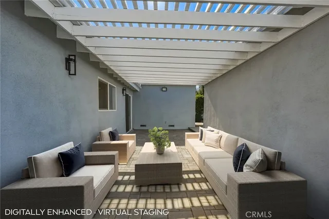 a view of a livingroom with furniture and a couch