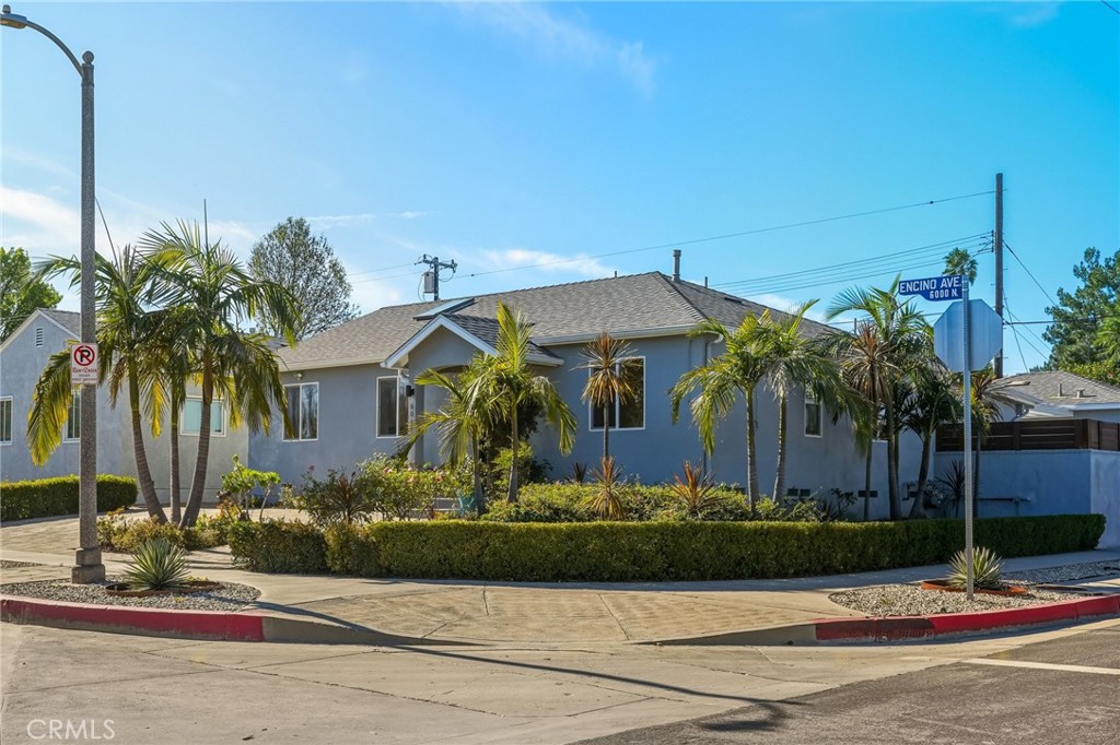 6017 Encino Encino, CA 91316 - Photo 49 of 51 a front view of a house with a garden