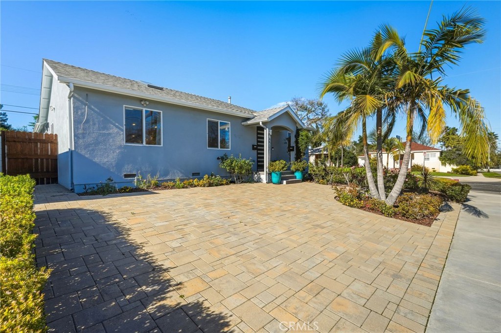 6017 Encino Encino, CA 91316 - Photo 5 of 51 a front view of a house with a yard