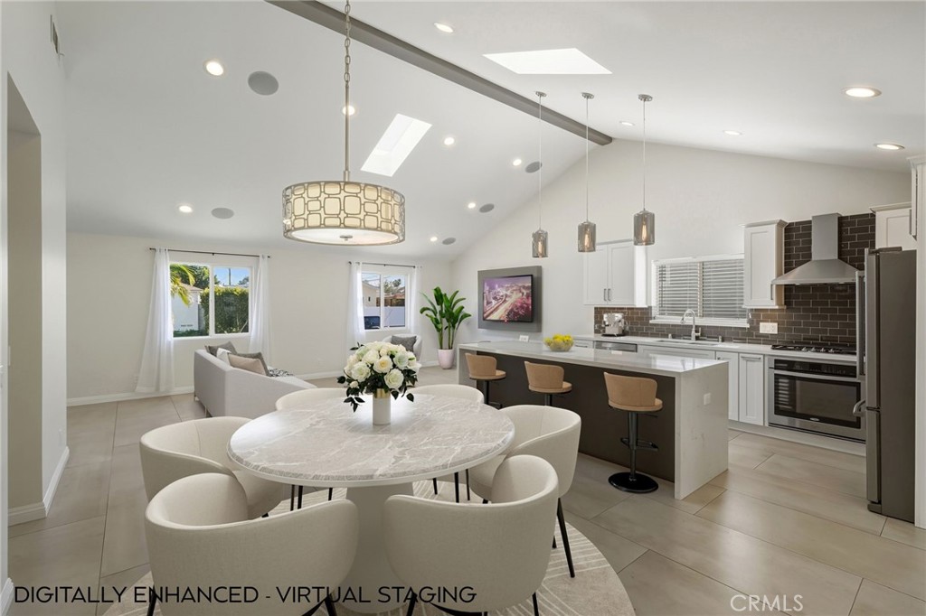 6017 Encino Encino, CA 91316 - Photo 8 of 51 a kitchen with a dining table and chairs