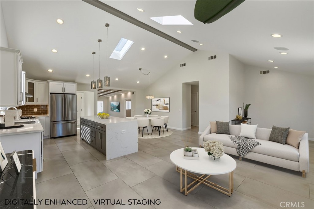 6017 Encino Encino, CA 91316 - Photo 9 of 51 a living room with kitchen island furniture and a view of kitchen