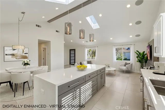 a kitchen that has a lot of cabinets in it