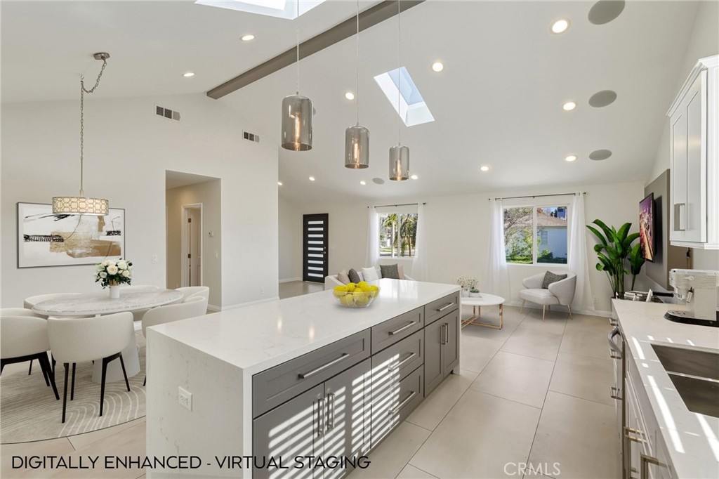 6017 Encino Encino, CA 91316 - Photo 10 of 51 a kitchen that has a lot of cabinets in it