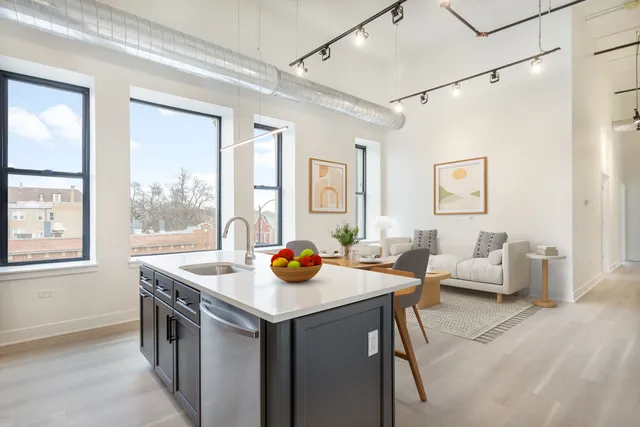 a view of a livingroom with furniture and window