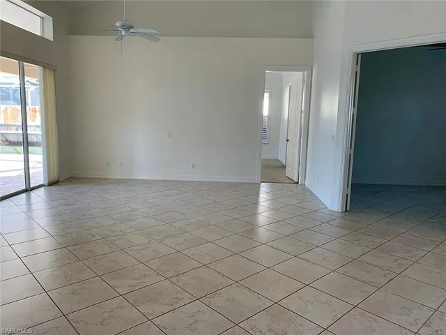 a bathroom with a white toilet and sink