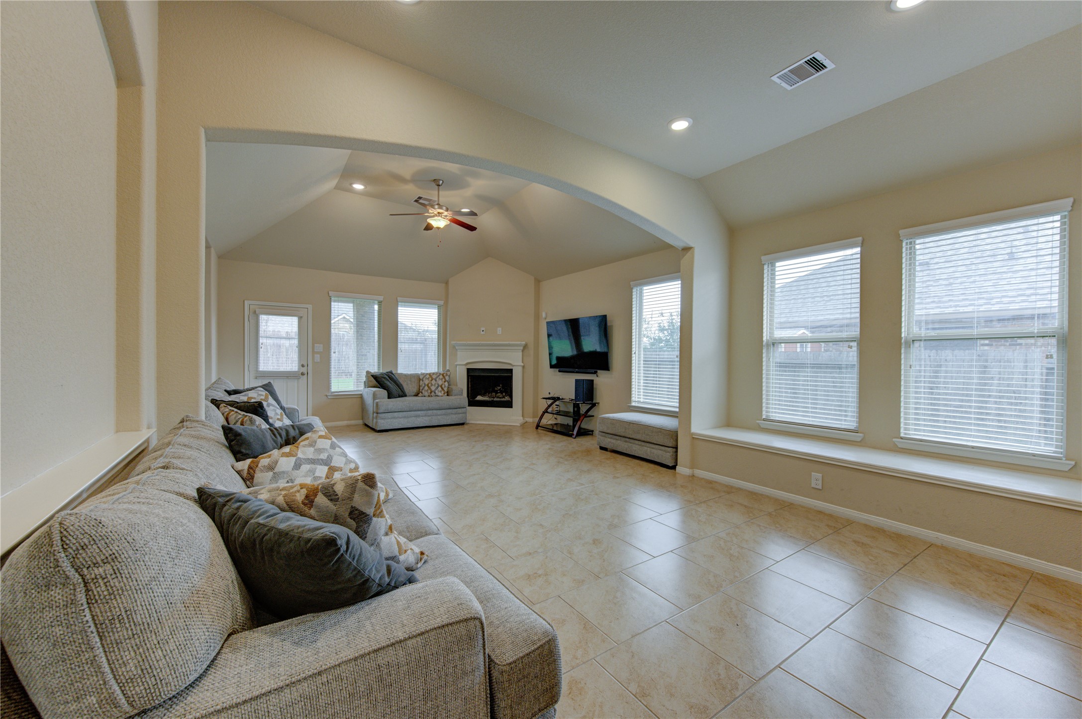 18106 Dorman Draw Lane Houston, TX 77044 - Photo 13 of 27 a living room with furniture and a large window