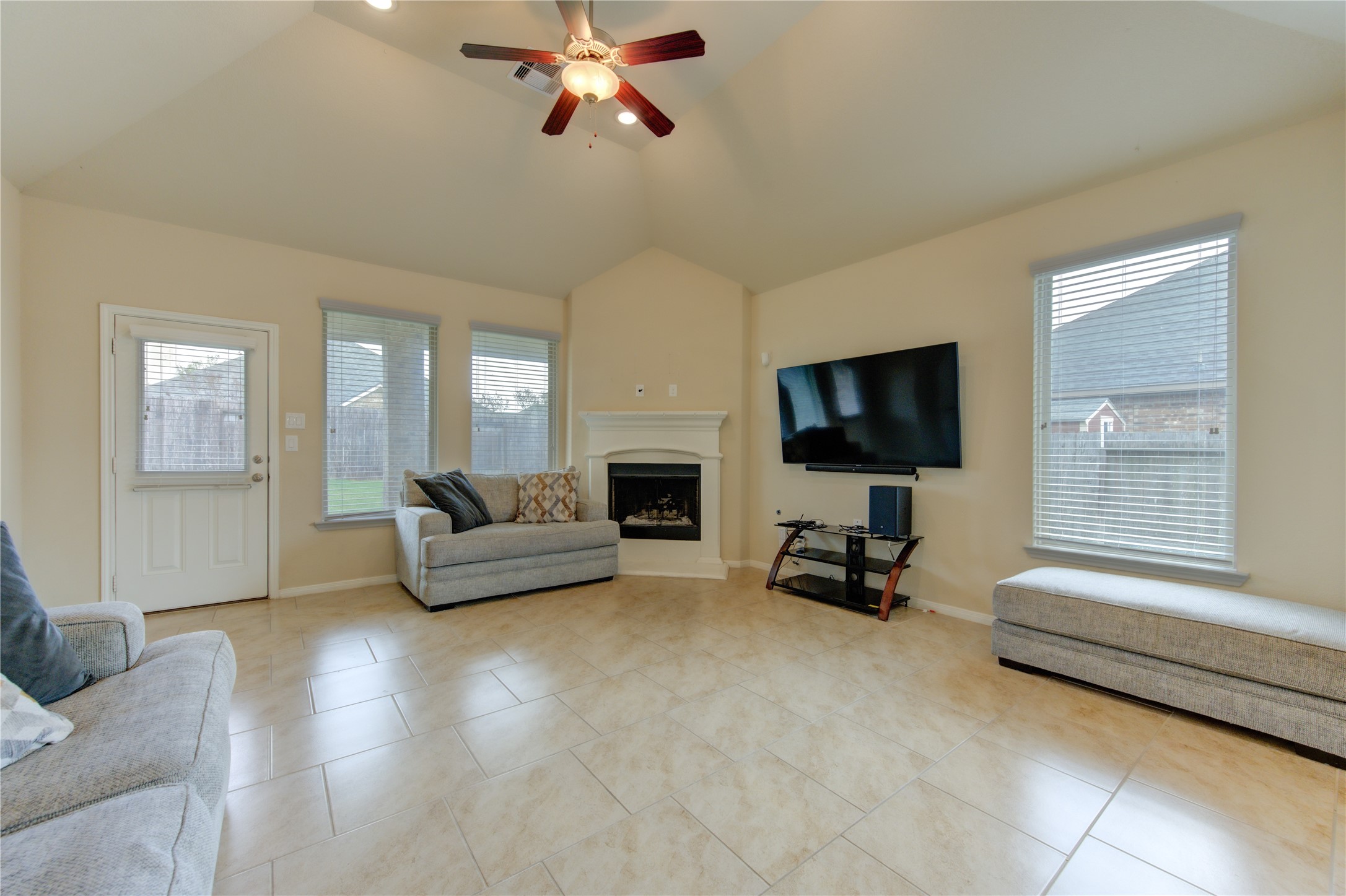 18106 Dorman Draw Lane Houston, TX 77044 - Photo 15 of 27 a living room with furniture and a flat screen tv