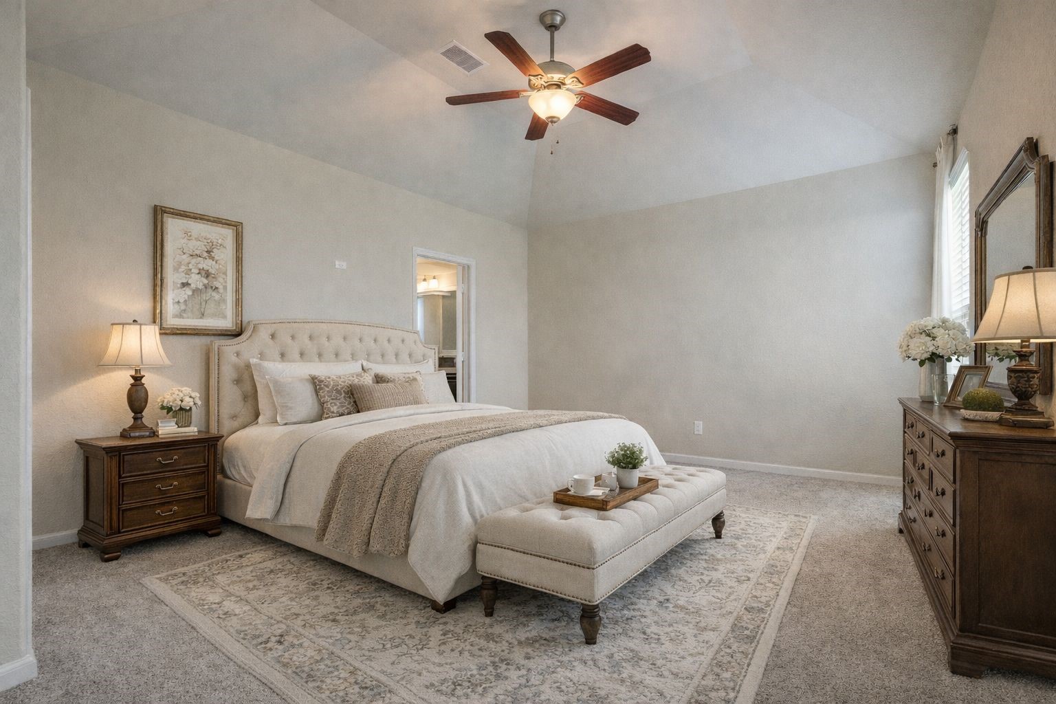 18106 Dorman Draw Lane Houston, TX 77044 - Photo 16 of 27 a spacious bedroom with a bed and a chandelier