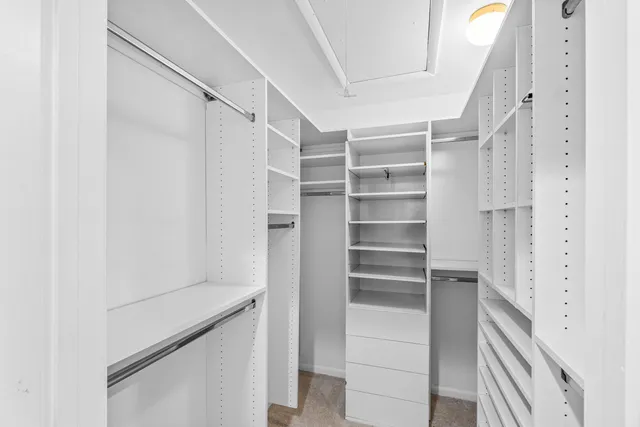 a bathroom with a tub and shower