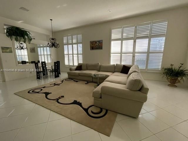 a living room with furniture and window